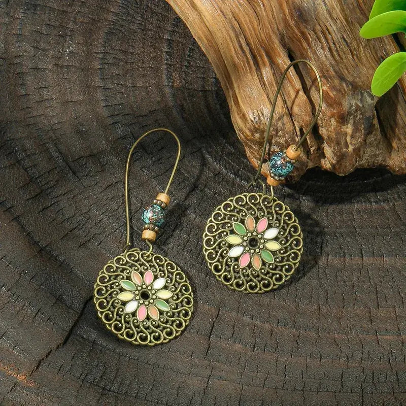 1- Dazzle Drama Handcrafted Ethnic Drops - Metal Round Earrings