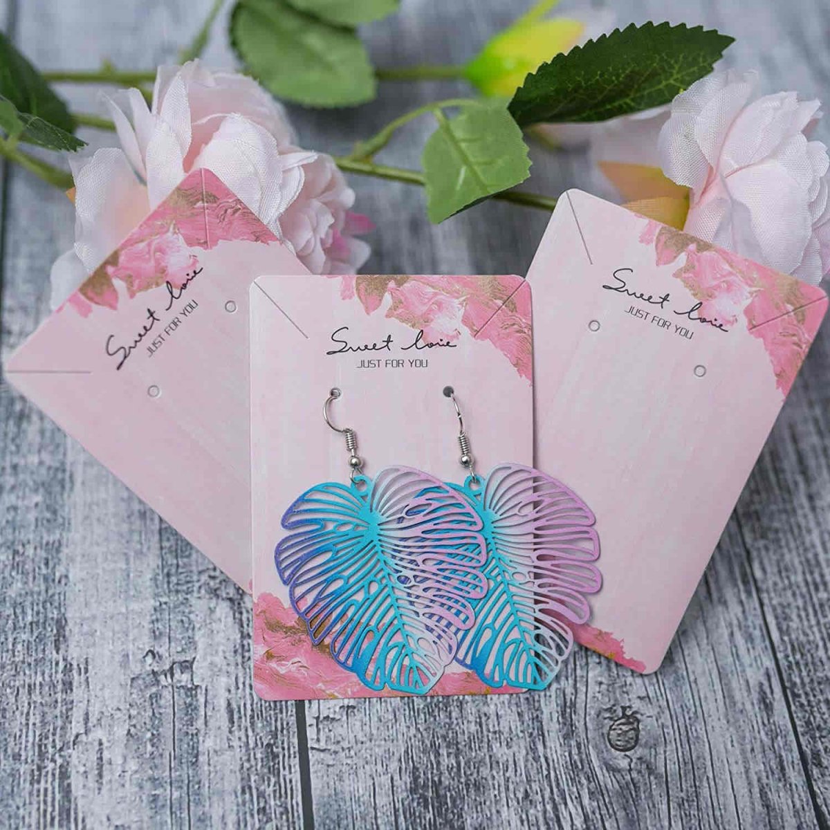 Image of an earring - Leaf Earrings - K - Pop Ecstatic Leaf Earrings by Zuzus Trove