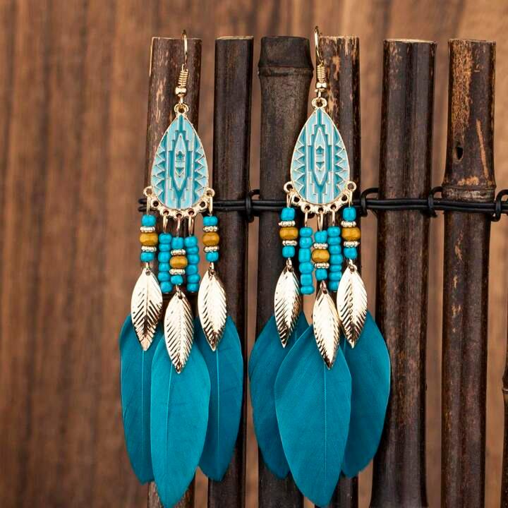 Image of an earring - Long Earrings - Blue Feather Earrings by Zuzus Trove